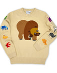 Beige sweater with brown bear design on a white background