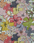 floral pattern of green, orange, pink, yellow.