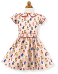 Vintage-inspired pink outfit with bear print, red trim, and a full skirt. Soft cotton, fully lined, perfect for parties and special occasions