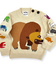 Soft beige knit sweater with a brown bear illustration and colorful embroidered animals