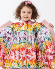 Girls' Rainbow Bloom floral dress with vibrant multicolor flowers and butterfly print, featuring puff sleeves, a waist tie, and a twirl-worthy silhouett