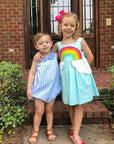 Collage of girls wearing the Over the Rainbow Sundress in sky blue, styled outdoors and indoors, showcasing its playful and colorful design.