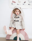 Stylish and warm Snowshoe Rabbit Coat for toddlers, made of Merino wool with a soft cuddle faux fur lining.