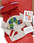 Love From The Very Hungry Caterpillar hardcover book in a gift box with a themed children's coat and handwritten note.