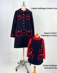 Coordinated dark blue wool winter coat for women and girls’ pocket dress set with a Paddington Bear-inspired design.