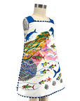 A sleeveless mermaid dress with ocean-themed artwork, blue shoulder straps, and a scalloped hem, featuring dolphins, jellyfish, and a swimming mermaid