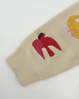 A detailed video showcase of the Brown Bear knit sweater with close-ups of the animal embroidery