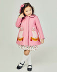 Pink Dog coat on Model
