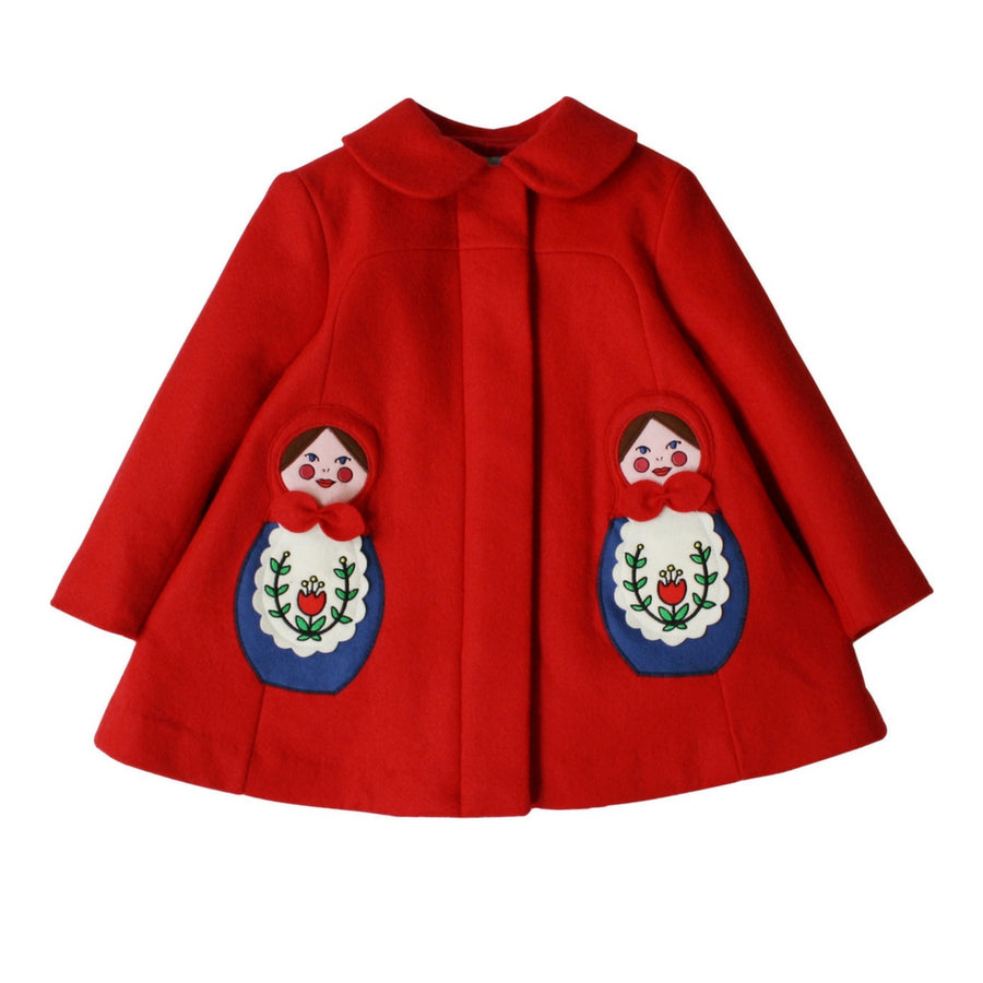 red wool coat with collar and hidden buttons beneath placket with two embriodered matryoshkas on left and right side of coat