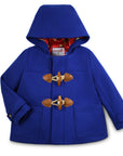 Children's royal blue wool duffle coat with a hood, wooden toggle closures, and red satin lining featuring Paddington Bear print.