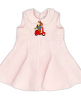 Blush Linen Scooter Bunny Dress, featuring embroidered bunny on a red scooter. Sleeveless linen dress with a flared skirt and button back