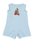 Light blue linen baby romper with embroidered bunny riding a red scooter, featuring back buttons and snap closures. Heirloom-quality toddler outfit.