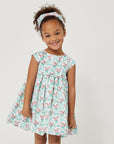 Willa Heart Carrot and Dot Dress in mint, styled with a matching headband and bubble skirt