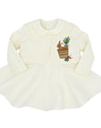 Ivory linen bunny jacket by Little Goodall, embroidered with a bunny in a bushel of carrots, paired with a matching dress