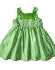 Green gingham sundress for girls with an alligator applique, scalloped hem, and button accents. Lightweight and perfect for summer