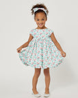 mint dress with a carrot trellis pattern, cap sleeves, and a gathered bubble skirt
