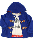 kids n Bear Sweater in ivory, featuring a black knit Paddington Bear illustration, layered under a classic blue duffle coat with toggle closures