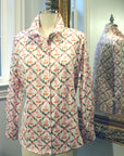 Mannequin wearing Willa Heart pink dog print cotton shirt with button cuffs and collar