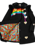 Ladies Queen of Hearts Coat in black wool blend with rainbow heart design, faux fur collar, and vibrant illustrated lining.