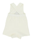 Little Goodall Back view of ivory linen bushel bunny romper with crisscross straps and elastic waistband