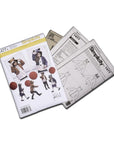 Simplicity 1477 sewing pattern set,including paper pattern pieces, illustrated instructions, and fabric guidelines for making children's fox and raccoon coats.