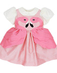 Pink flamingo dress paired with ivory puff sleeve blouse, featuring scalloped peplum and flamingo applique for summer outfit