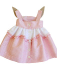 Back view of Little Goodall Pink Gingham Bunny Love Dress with button closure, ruffle trim, and bunny ear accents. Adjustable straps for longer wear