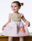 Toddler wearing Little Goodall Pink Gingham Bunny Love Dress with floppy ears, embroidered face, and carrot accents. Sweet and twirl-worthy.