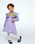 Girls' lavender coat with oversized butterfly collar, inspired by The Very Hungry Caterpillar.
