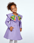 Elegant girls' butterfly coat in purple wool with hand-stitched details and magenta lining