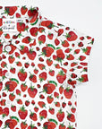 Close-up of a kids' strawberry print button-up shirt featuring The Very Hungry Caterpillar™ design
