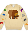 Beige sweater with bear design on the front and colorful animal illustrations on the sleeves