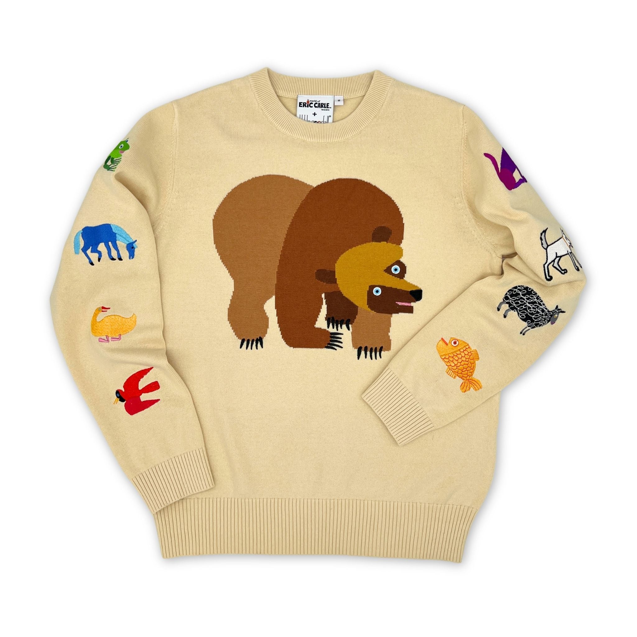 Beige sweater with brown bear design on a white background