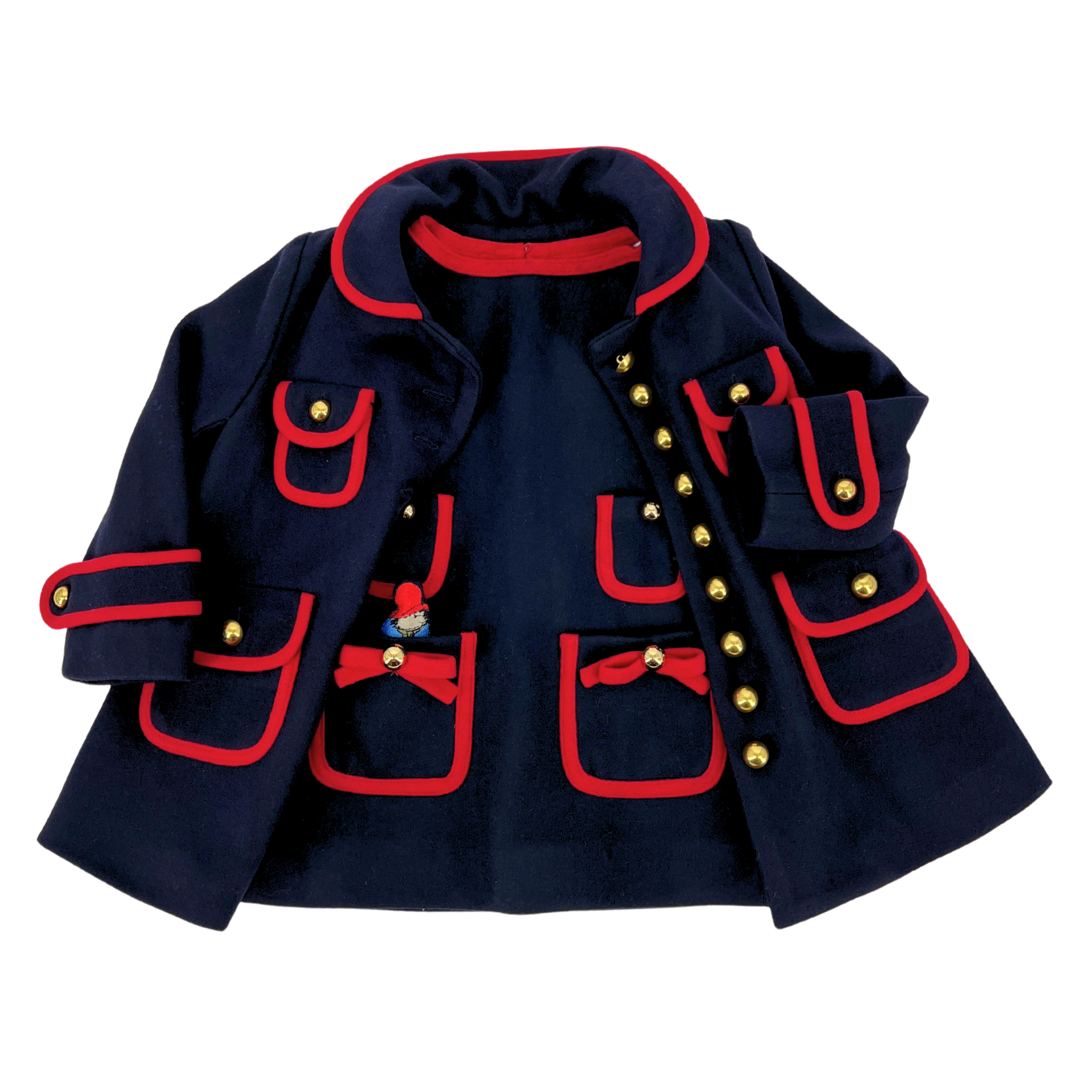 Little Goodall Girls Pocket Paddington Bow Dress and matching navy wool coat with red trim, gold buttons, and playful embroidered details