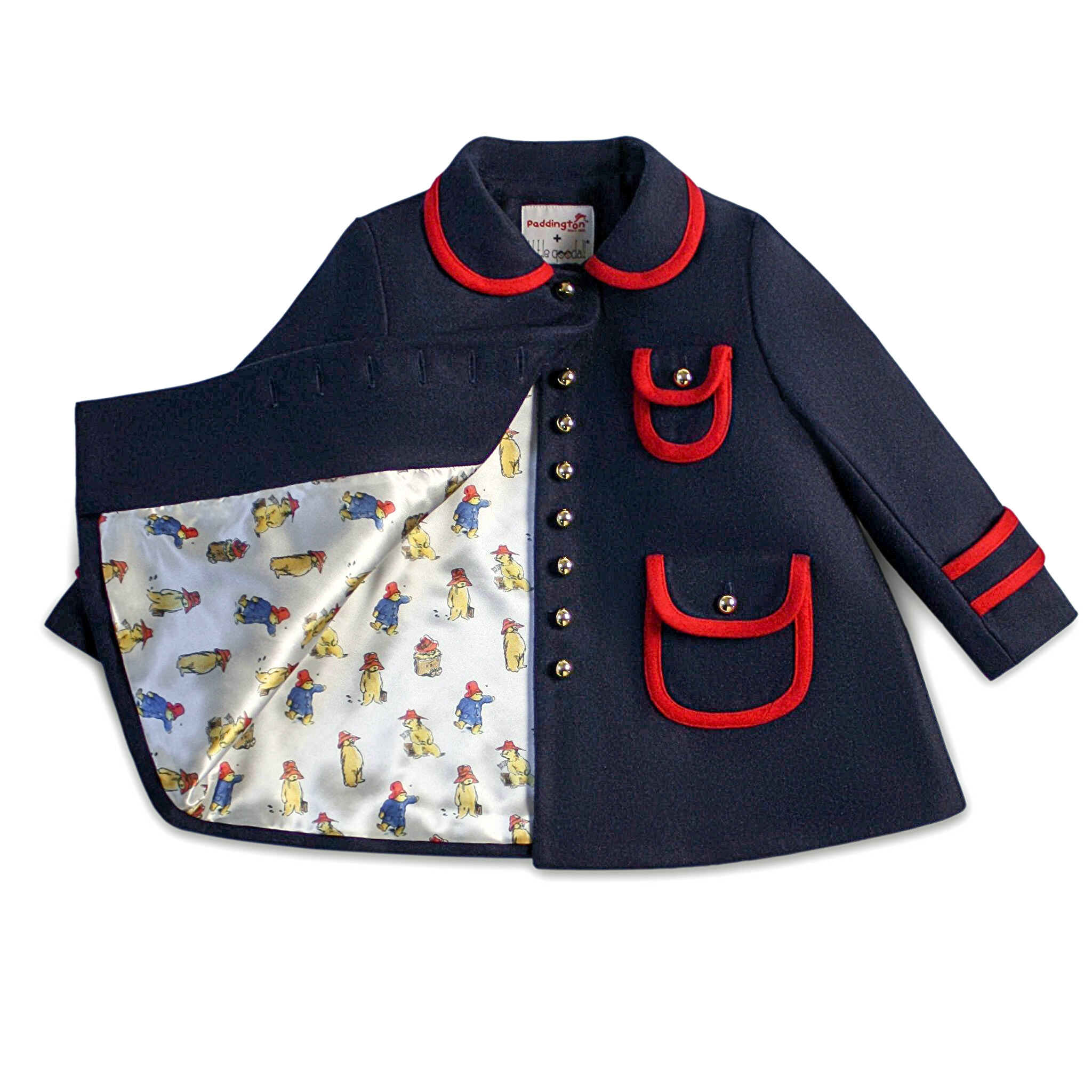Elegant dark blue winter coat with red trim, gold buttons, and a charming illustrated satin lining. Warm wool-blend fabric