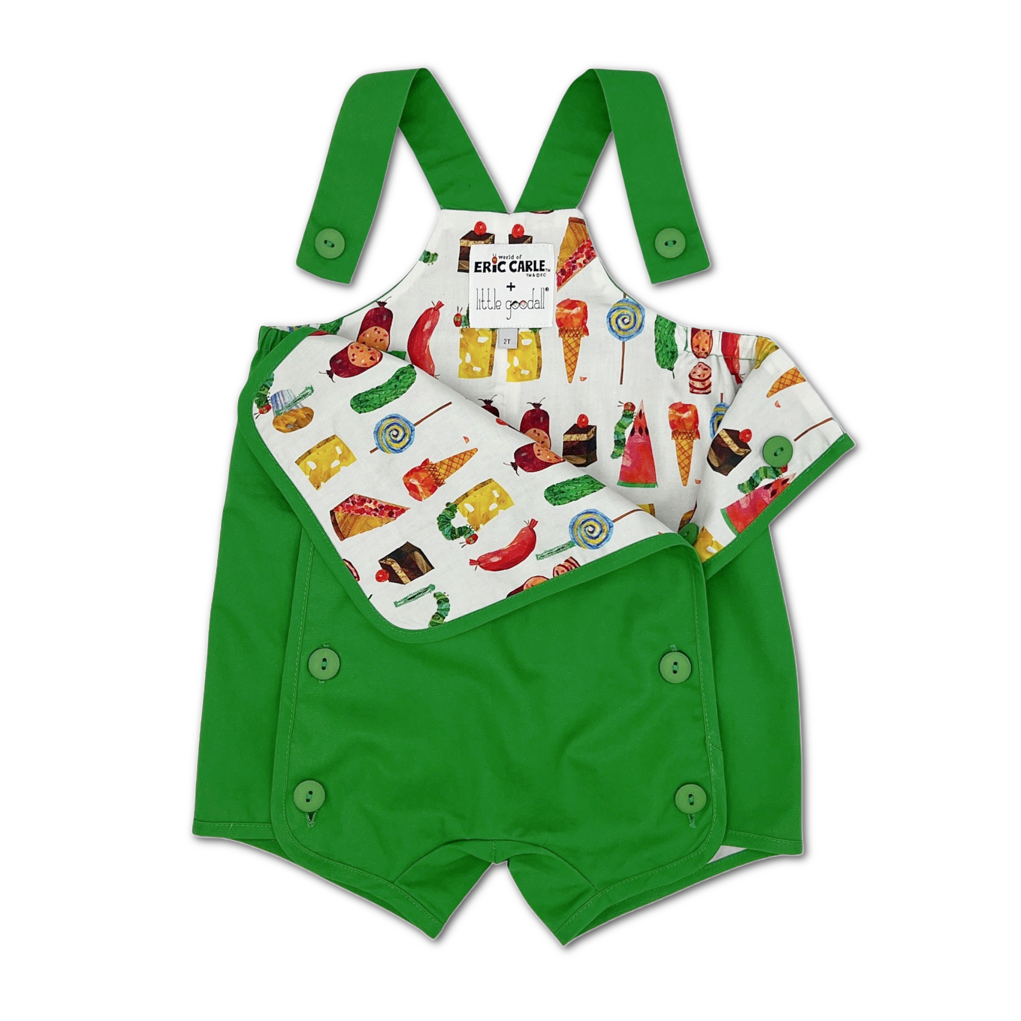 Toddler wearing a green Hungry Caterpillar romper with embroidery, layered over a food print shirt, featuring adjustable straps and side buttons