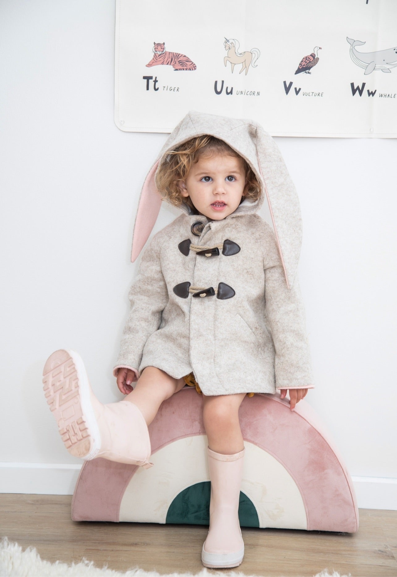 Stylish and warm Snowshoe Rabbit Coat for toddlers, made of Merino wool with a soft cuddle faux fur lining.