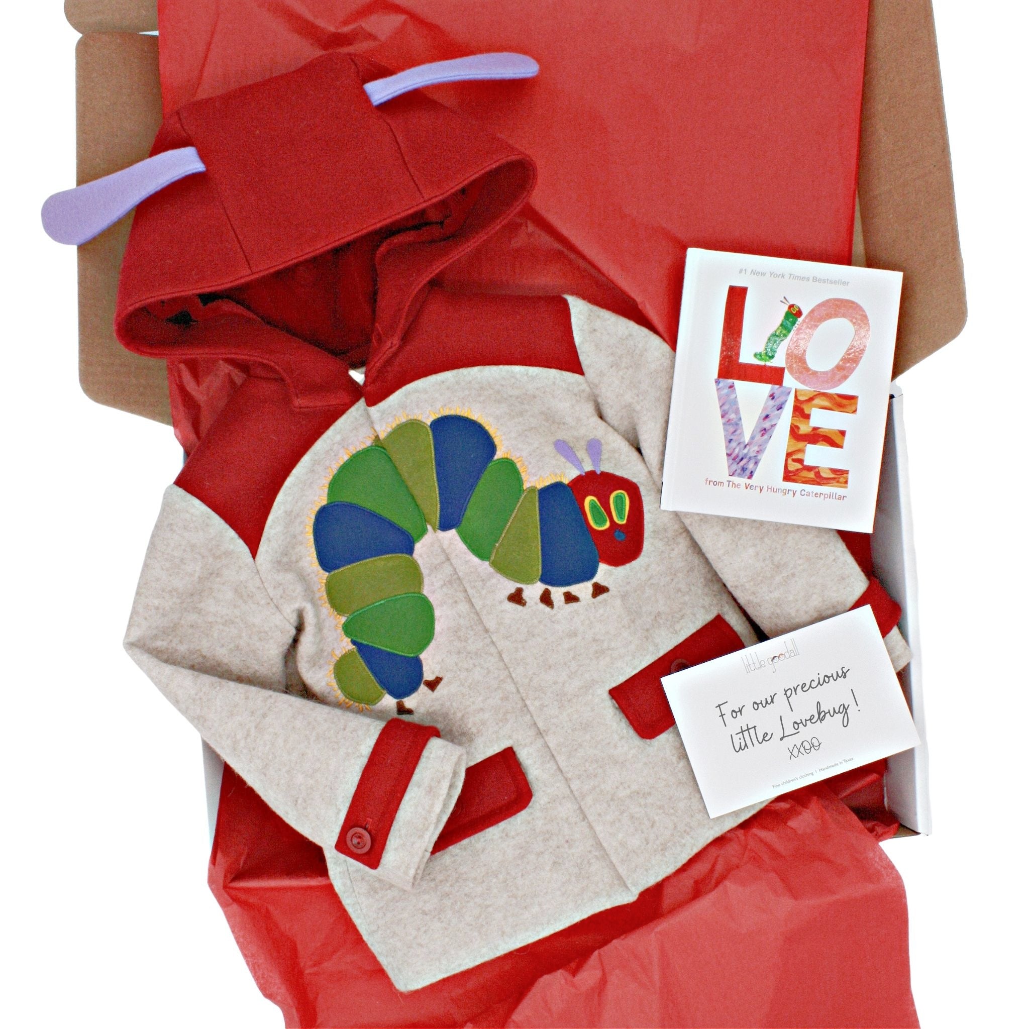 Love From The Very Hungry Caterpillar hardcover book in a gift box with a themed children's coat and handwritten note.