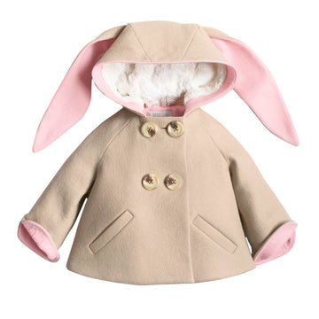 Beige wool bunny coat with pink-lined ears, faux fur hood, and double-breasted buttons