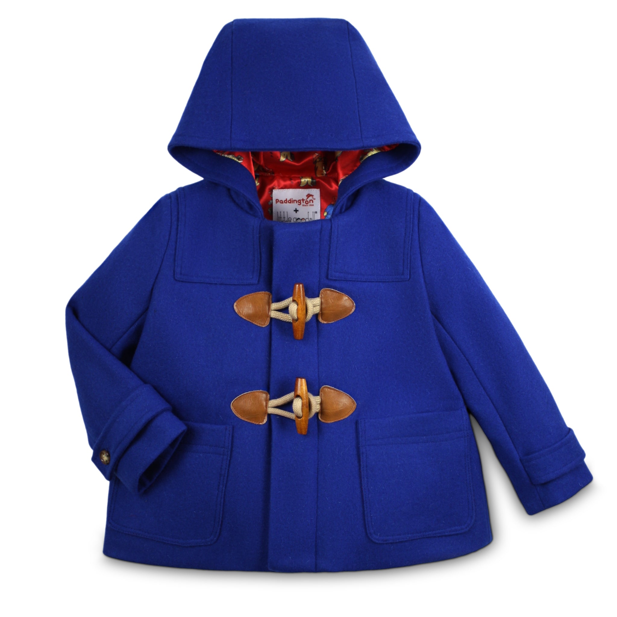 Front view of Classic Toggle Coat for kids in royal blue wool, with a cozy hood, red satin Paddington lining, wooden toggles, and deep front pockets