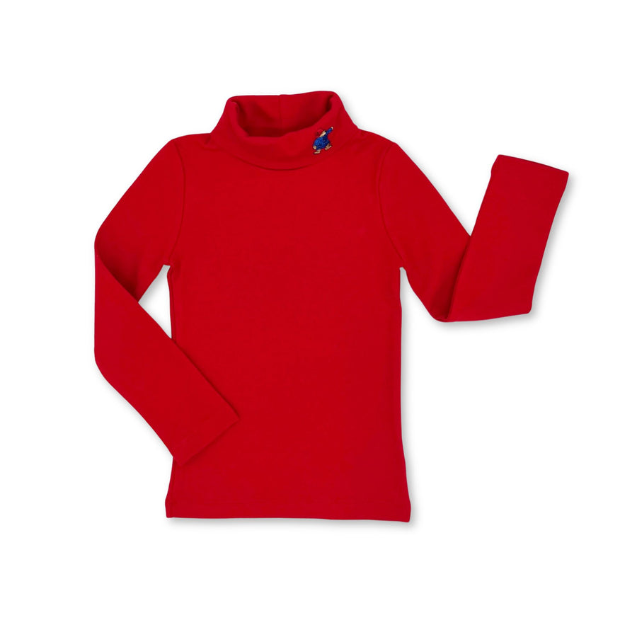 Little Goodall organic cotton red turtleneck for kids featuring an embroidered Paddington Bear on the collar. Soft, cozy, long-sleeved, and ideal for layering