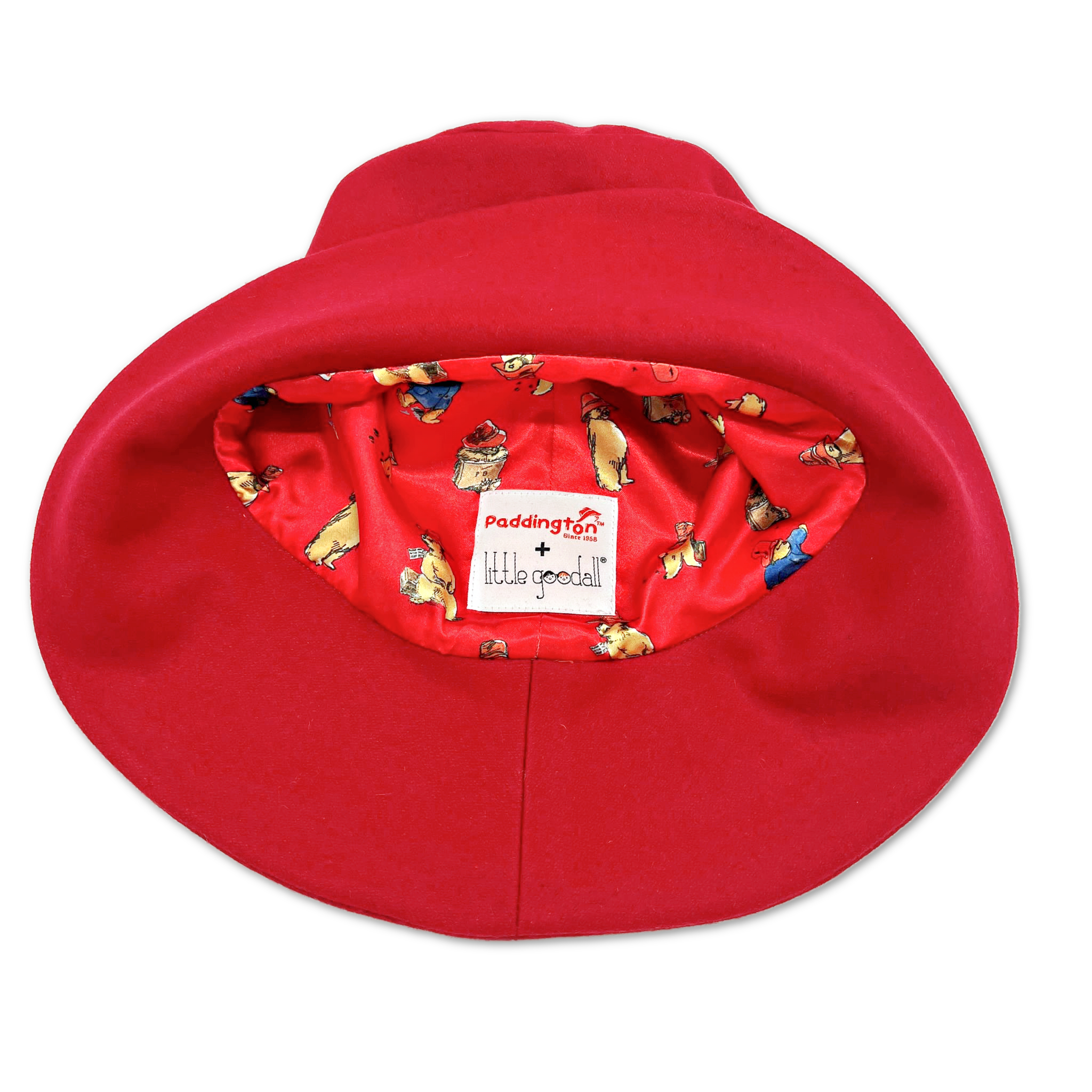 A close-up of the Little Goodall Paddington Bear red bucket hat, showcasing its playful illustrated lining with Paddington Bear prints
