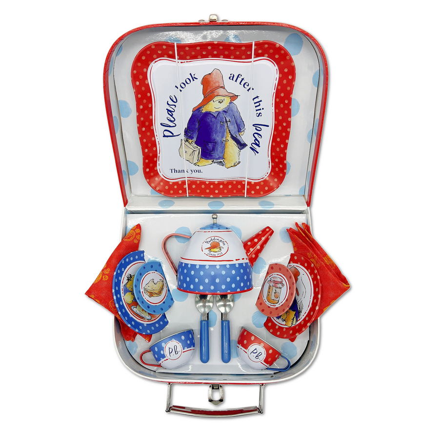 Paddington Bear tin tea set in a red suitcase with classic illustrations, featuring cups, saucers, a teapot, and accessories for kids' tea parties