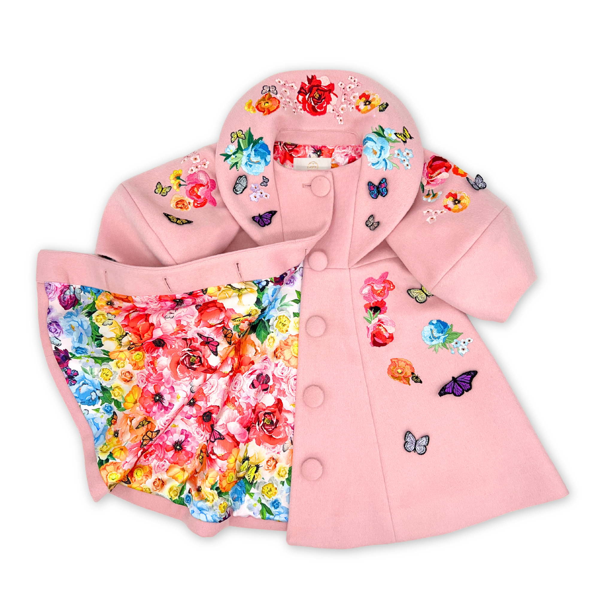 Pink wool girls' coat with floral embroidery, butterfly appliqués, and vibrant watercolor print lining. Elegant and perfect for special occasions