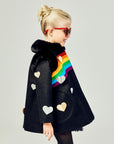 Right view of black coat displaying hearts towards the top of the back of the coat.