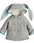 light grey coat with bunny ears on the hood and white lining within the hood. The body is completed with light blue lining and six grey buttons, in pairs, down the front.