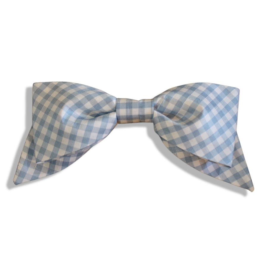 Blue gingham hair bow with an oversized design, handmade and attached to a secure alligator clip