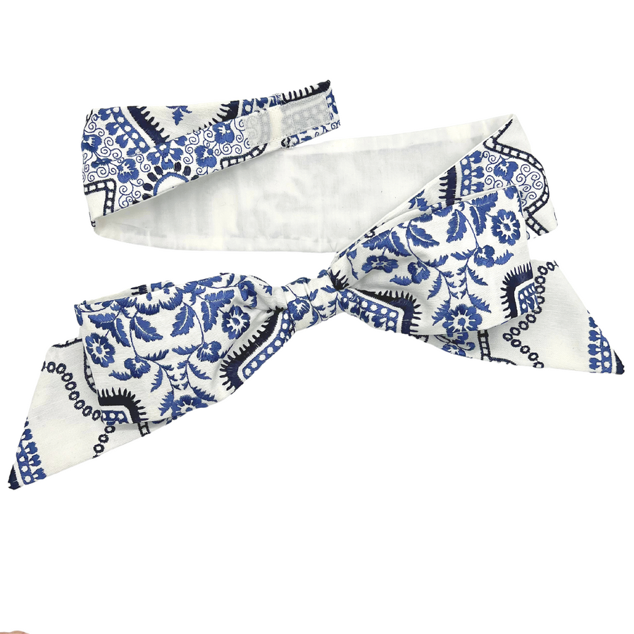 Blue and White Embroidered Hatband displayed in detail. Features removable Velcro closure for easy customization across ladies' sun hat styles