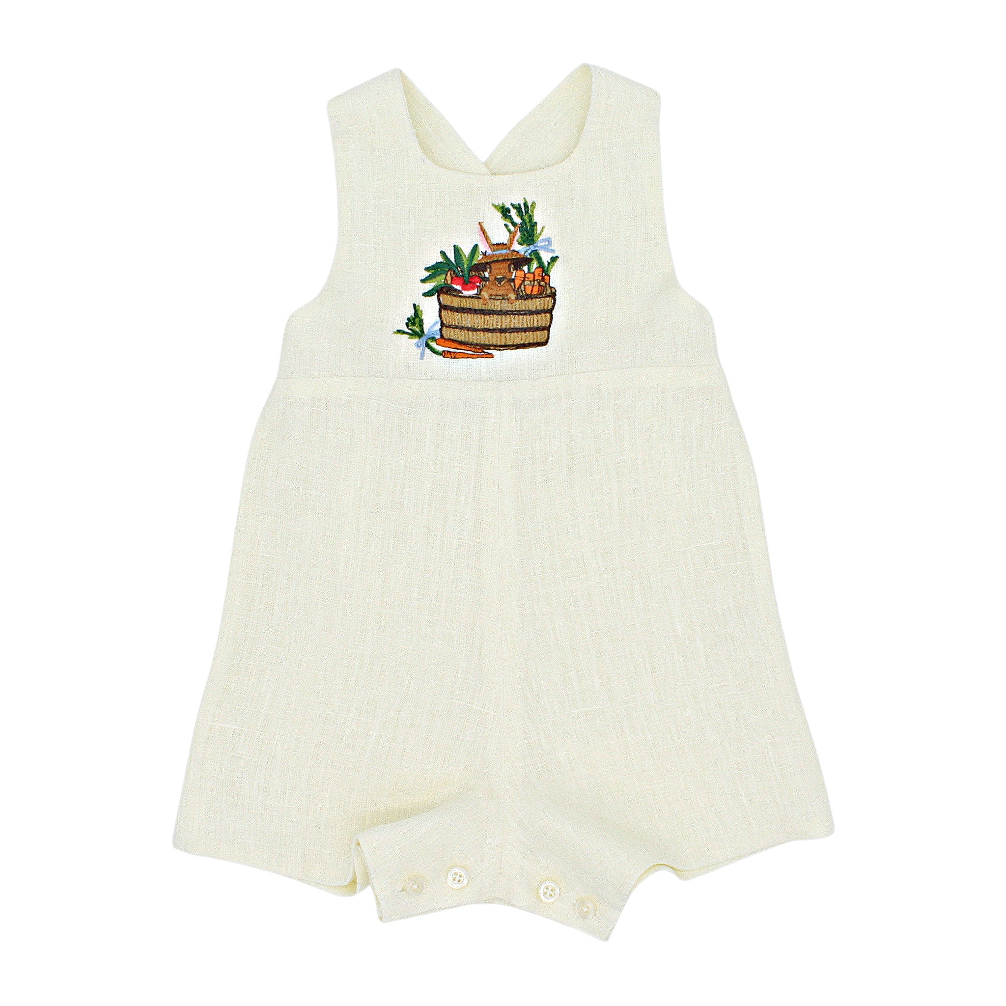Ivory linen romper with embroidered bunny in a basket, adjustable straps, and button closures. Gender-neutral baby and toddler outfit