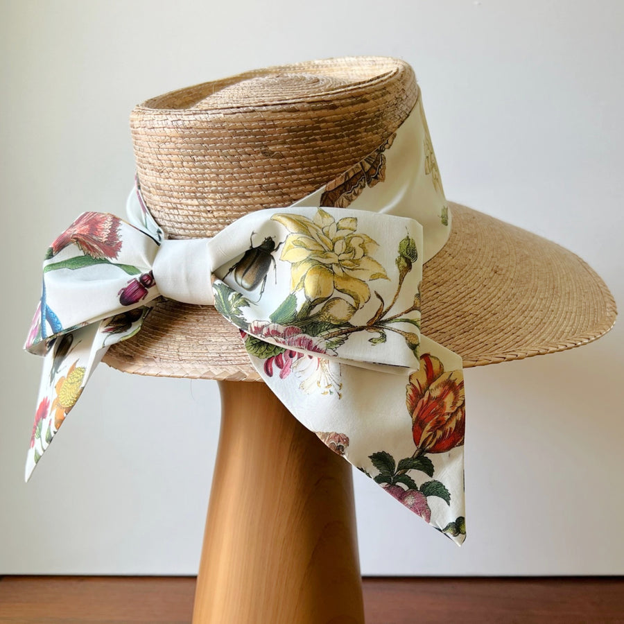 Ivory floral Middy Bow hatband with large botanical print and hidden Velcro closure